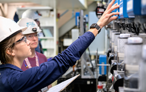 Nuclear plant professionals working on equipment