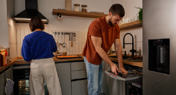 two people doing dishes